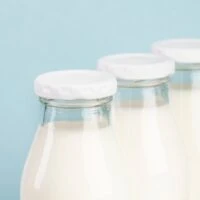 arrangement-with-bottles-filled-with-milk_23-2148239944