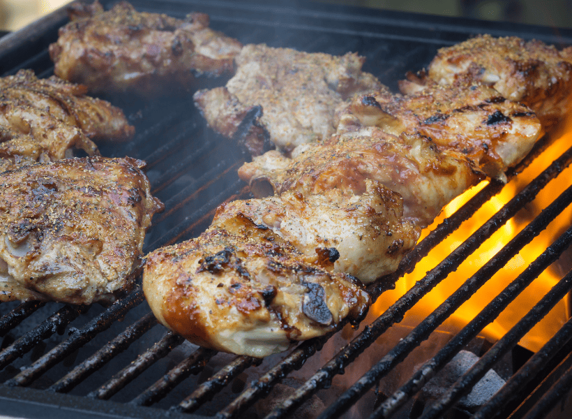 chicken thighs on bbq grill cooking