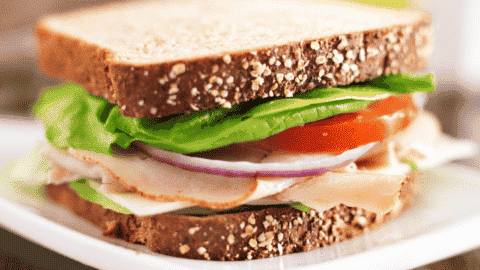 sandwich with lettuce tomato and deli chicken