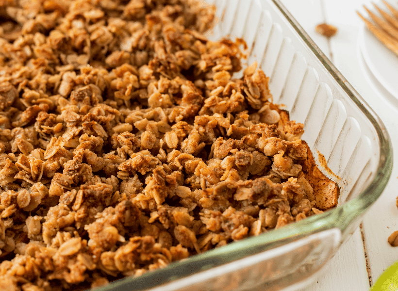 baked lightly browned apple crisp in pyrex dish