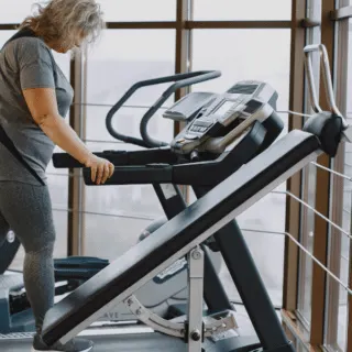 older woman over 50 on a treadmill
