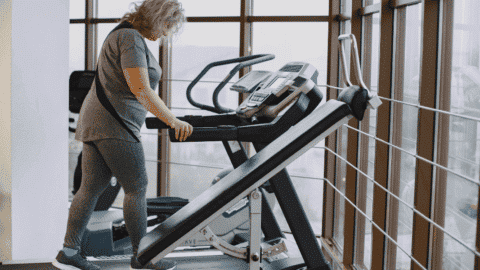 older woman over 50 on a treadmill