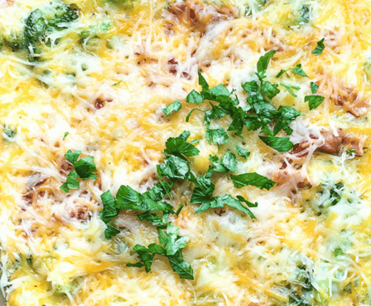 baked egg casserole with bacon and broccoli in pyrex dish