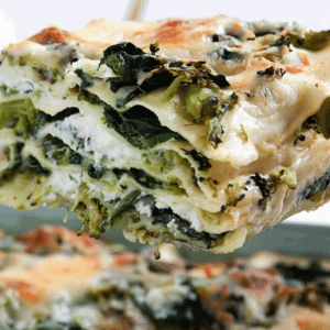 spinach and broccoli lasagna square being served