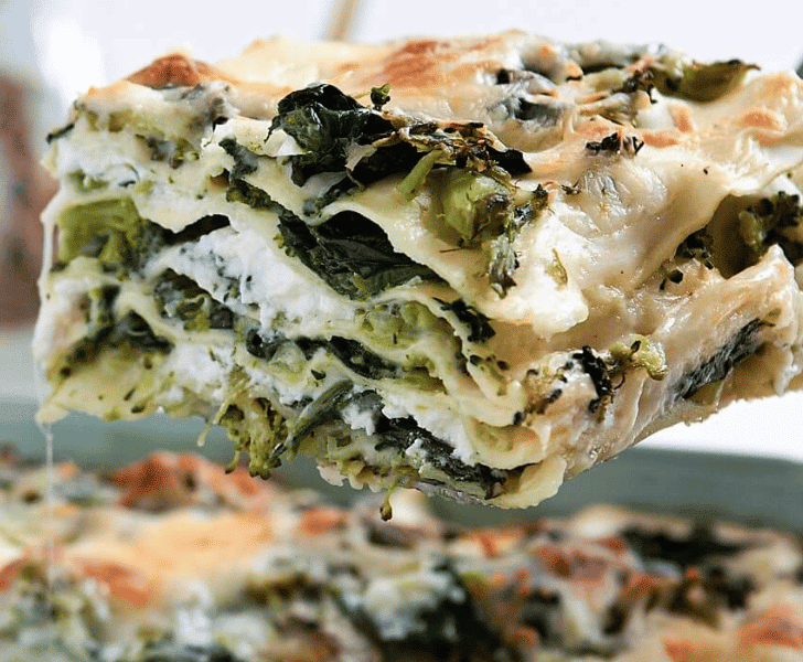 spinach and broccoli lasagna square being served