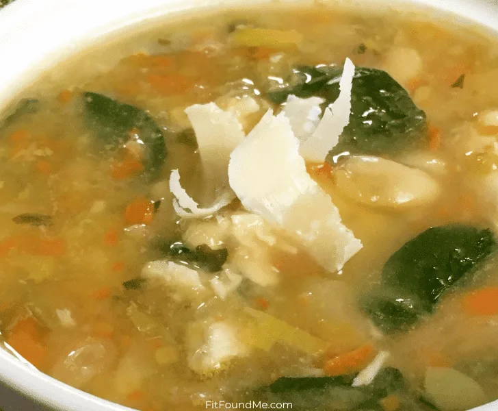 bowl of leftover thanksgiving turkey soup in white bowl