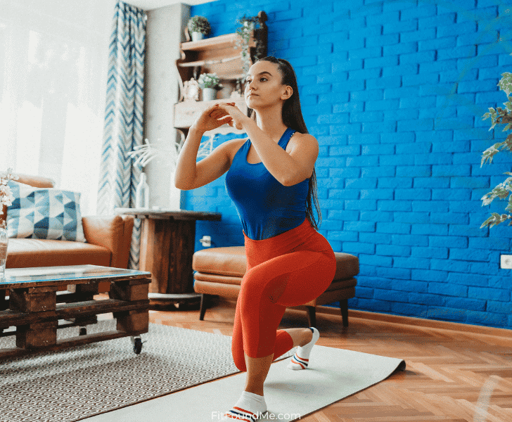 woman working out at home on yoga mat