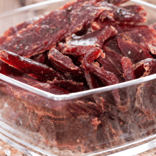 clear glass bowl of beef jerky