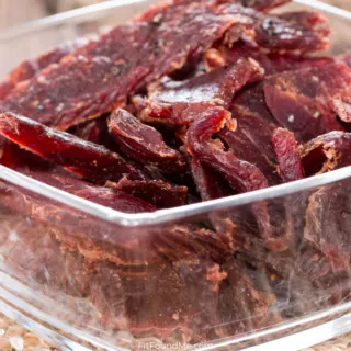 clear glass bowl of beef jerky