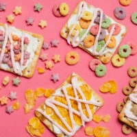 top-view-arrangement-with-tarts-pink-background