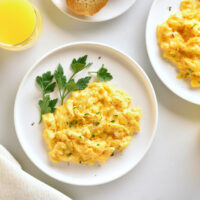 Healthy,Diet,Breakfast,Concept.,Scrambled,Eggs,And,Orange,Juice,Over