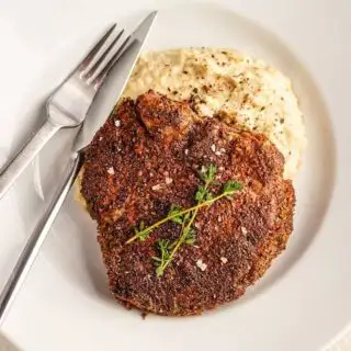 Pecan Crusted Pork Chop over Garlic Butter Cauli-Mash