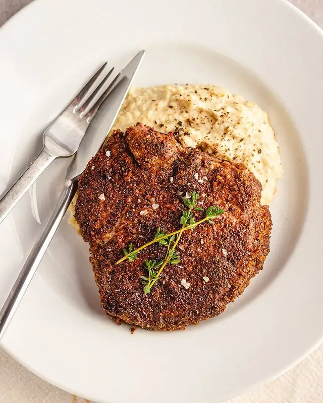 Pecan Crusted Pork Chop over Garlic Butter Cauli-Mash