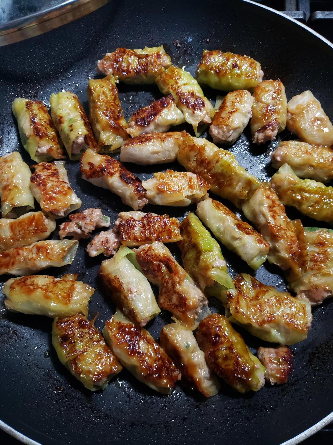 Keto Potstickers! Potstickers filling wrapped in cabbage and fried in ...