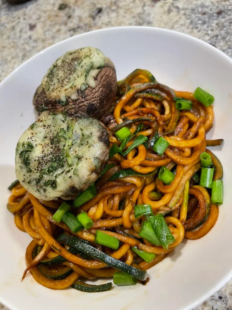Zucchini noodles and stuffed mushrooms