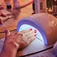 Client,With,Red,Varnish,At,Manicure,Salon,Cairfully,Waiting,When