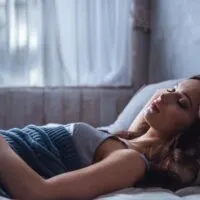 Beautiful,Young,Girl,Is,Sleeping,In,Bed,At,Home