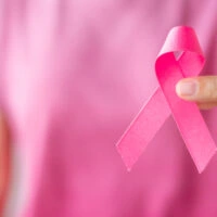 October,Breast,Cancer,Awareness,Month,,Woman,In,Pink,T-,Shirt